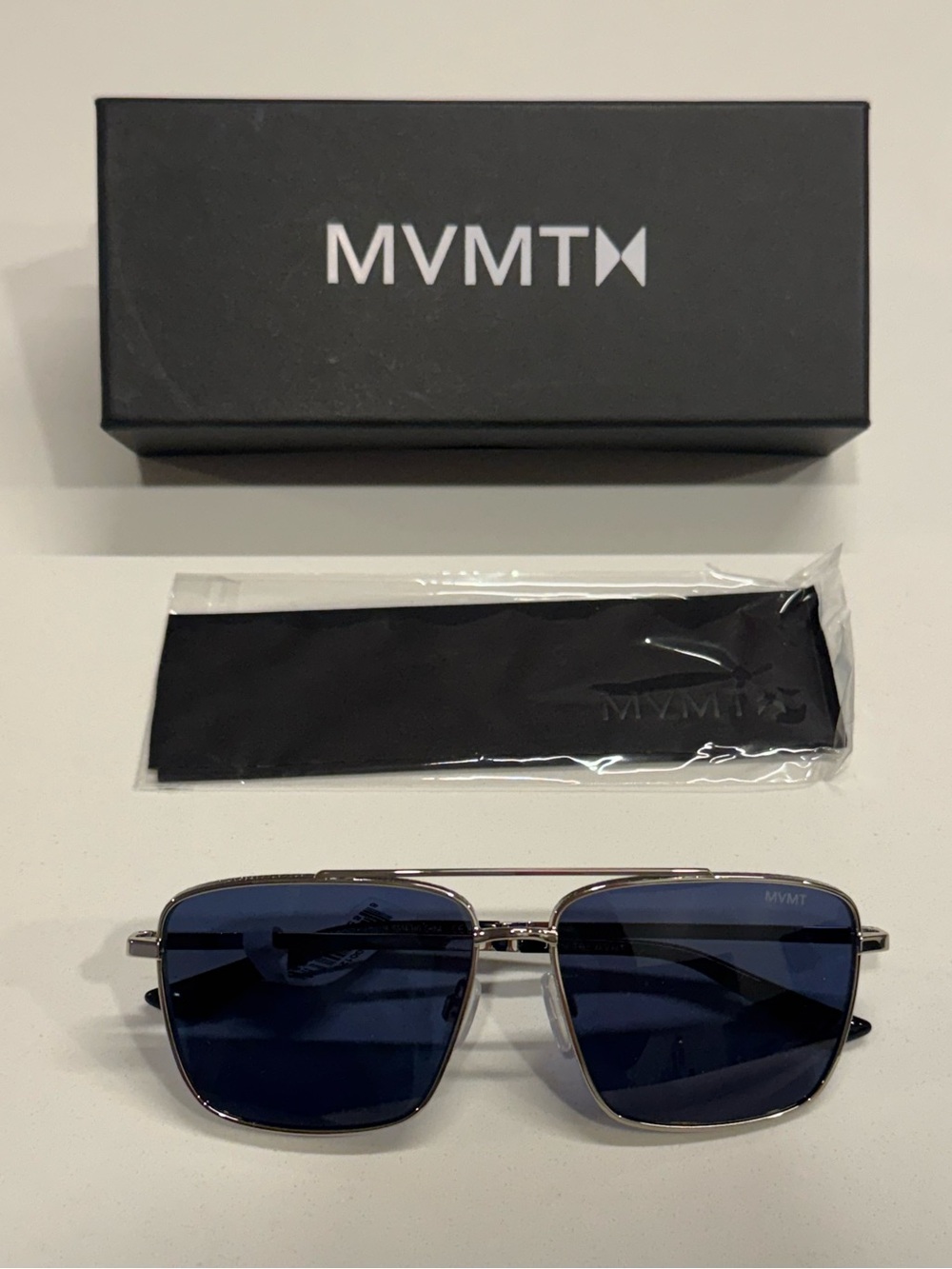 MVMT Navigator Sunglasses — Black Temples with Silver Arms Blue/Gray Lenses